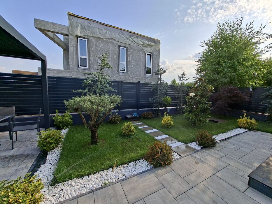 Amenajări grădini cu gazon si sistem de irigat