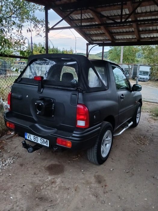 Suzuki Grand Vitara sau schimb cu mașina de teren cu bena