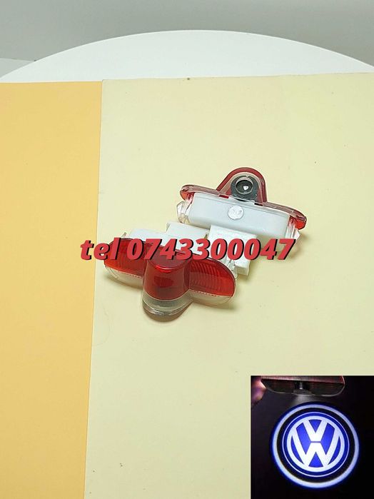 Proiectoare Logo Portiere Vw Golf 4 Caddy Touran Bora Passat