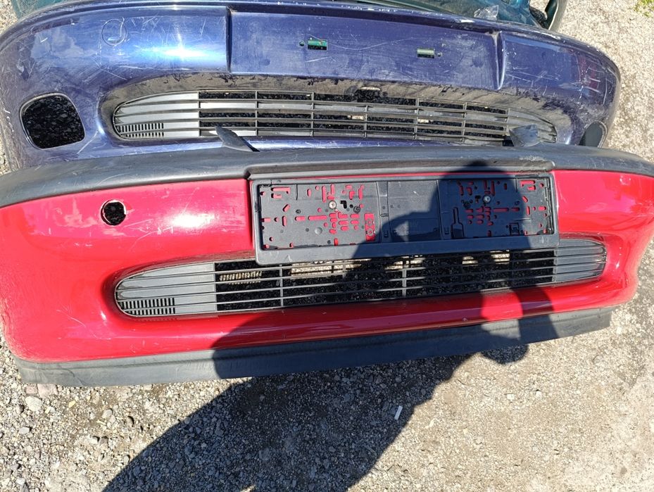 Бампера переднии на Опель Вектра В