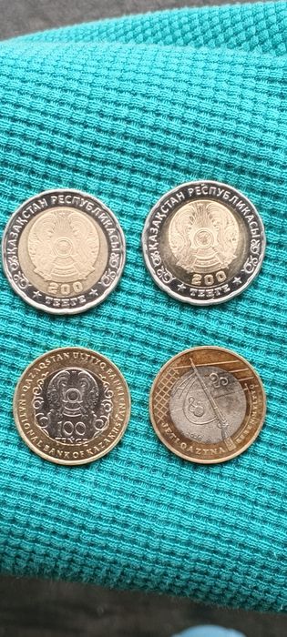 Продам юбилейные монеты  200 и 100