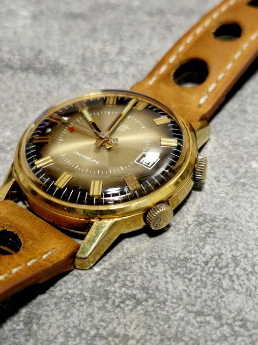 Ceas mecanic cu alarma  , placat cu aur