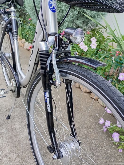 Vand bicicletă damă PEUGEOT,cu 7 vit Sram,frână picior!
