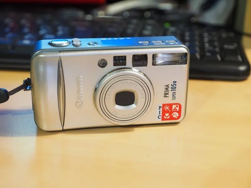 Canon PRIMA SUPER 105u лентов фотоапарат, запазен, с калъф