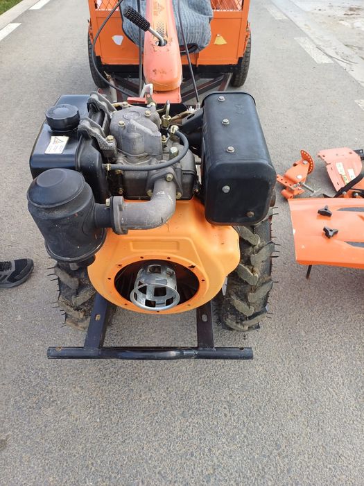 Motocultor cu remorcuta cu anexe marca ruris diesel 13 kp