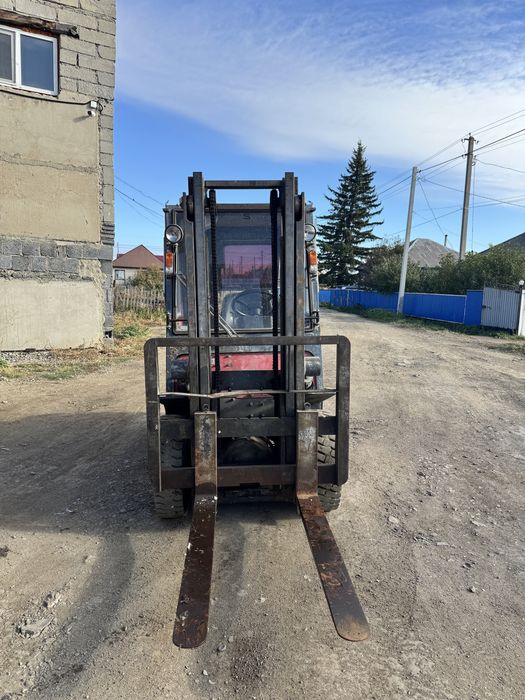 Продам погрущик nissan j01A15
