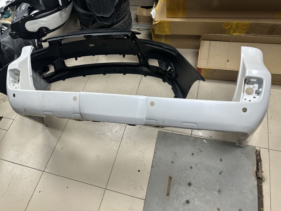 Задний бампер БУ Оригинал на 570 до рест