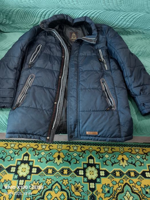 Продам зимний пуховик,недорого