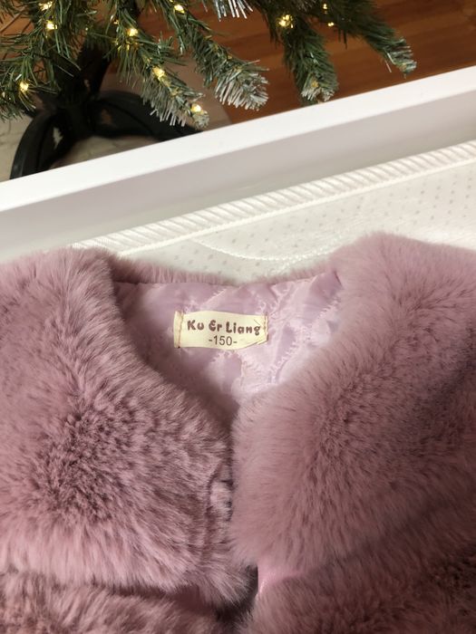 Продам меховую жилетку