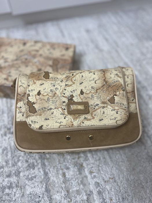 Косметичка кожаная дорожная