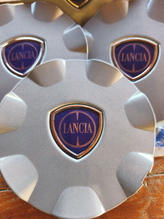 Set 4 capace centrale jante aliaj  Lancia (Delta,  Ypsilon)