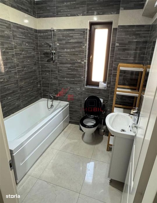 Apartament nou, 1 camera decomandat, mobilat si utilat, loc de parcare — fotografia 3
