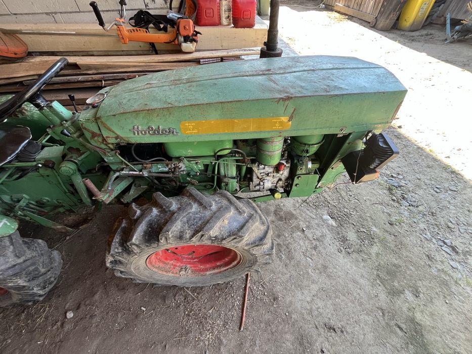 Se vinde acest tractor holder
