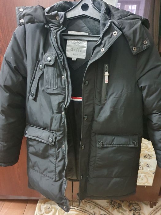 Продам зимний пуховик
