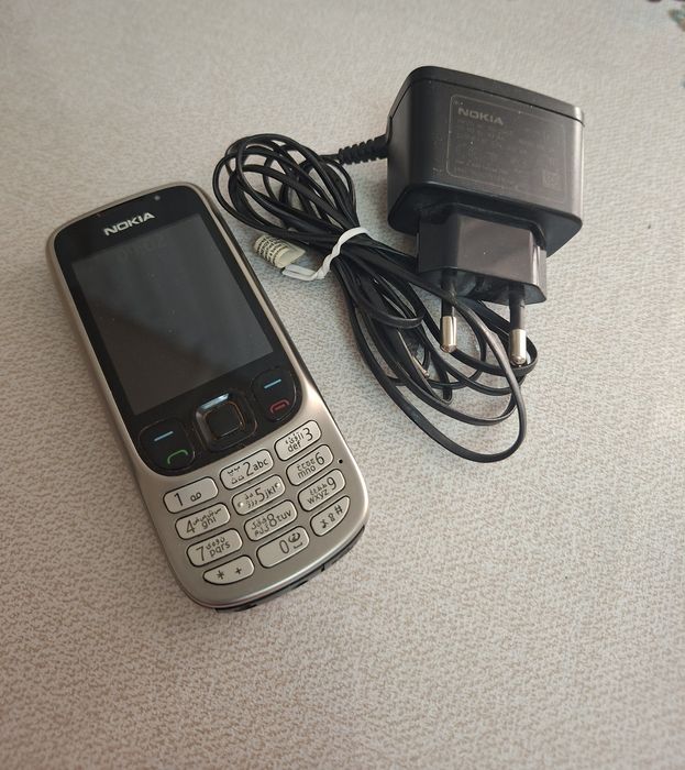 Nokia 6303i Original zaraydchik bilan birga