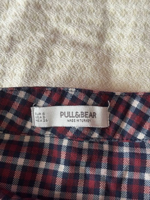 Продам мини юбку в клетку pull and bear