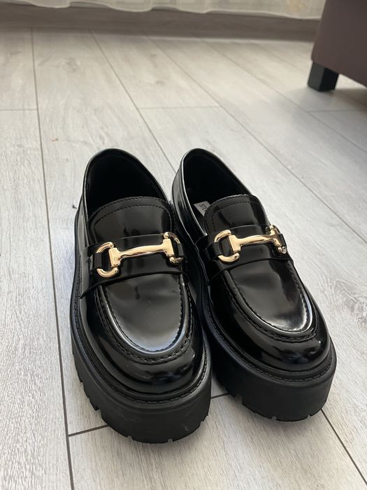 Papuci steve madden ocupy