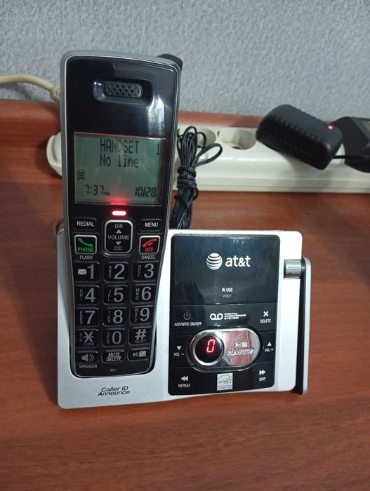 Продам радиотелефон AT&T четыре трубки на один телефонный номер.