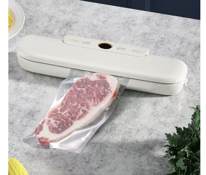 Вакуумный упаковщик