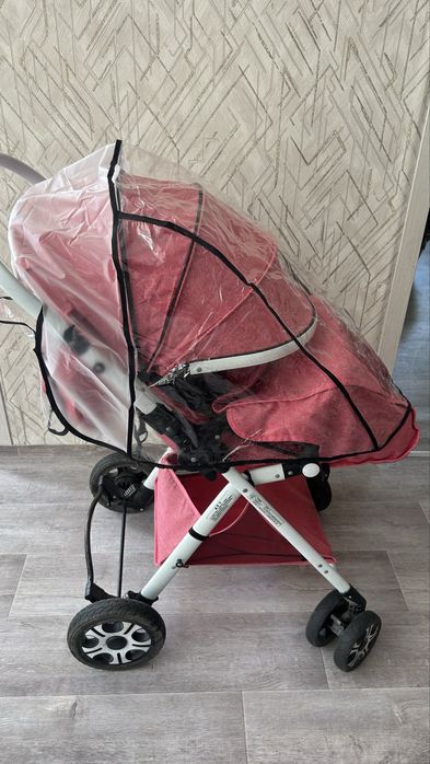 Продам коляску розовую