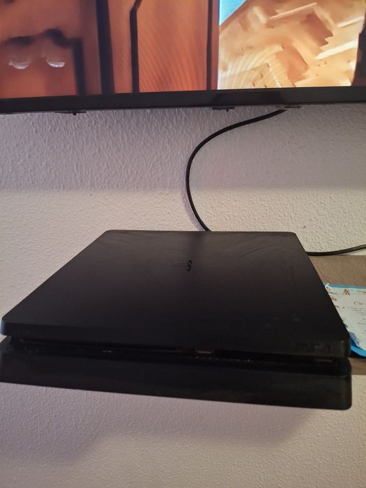 Vand ps 4 slime ,cu 7 jocuri si 2 manete