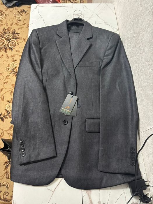 Продам брючной костюм