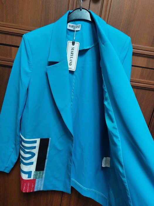 Костюм женский янги умуман кийилмаган