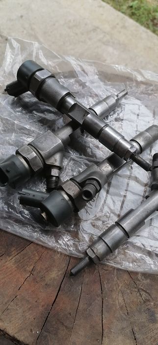 Injectoare Laguna 2 1,9dci