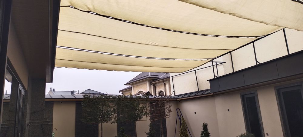 Солнцезащитные теневые сетки.