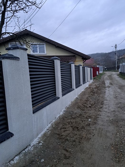 Executăm porți la comanda clientului din lamele executăm porți din șipcă metalică executăm porți din tablă decupată executăm porți din tablă cutată ex