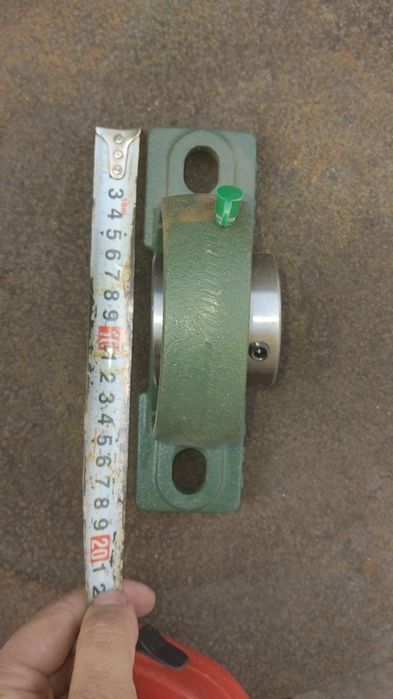 Продам подшипник в корпусе.