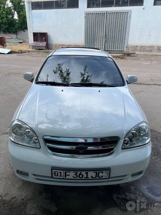 Lacetti 2009, белый
