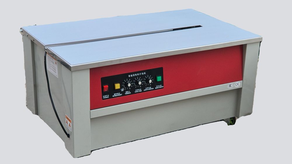 SHT-001 - past stolli yarim avtomatik bog'lash mashinasi.  Strep Lenta