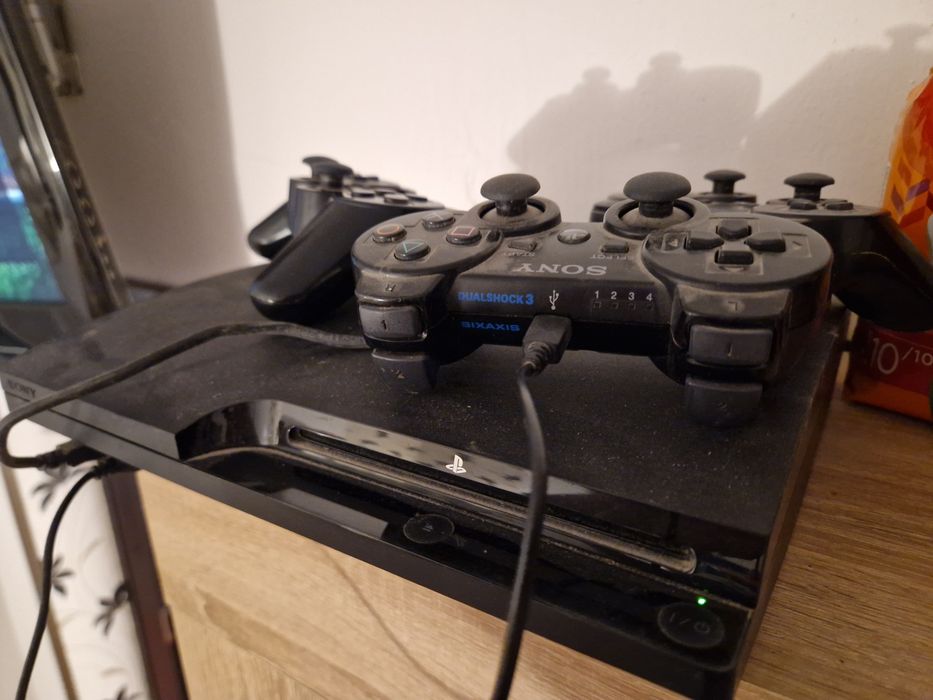 Ps3 slim 3 joystick-uri wireless + 34 jocuri Originale