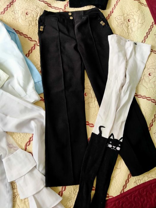 Продам школьный рюкзак и одежду