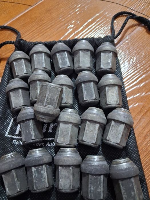 Set 20 piulțe originale ptr.Ford jante aliaj