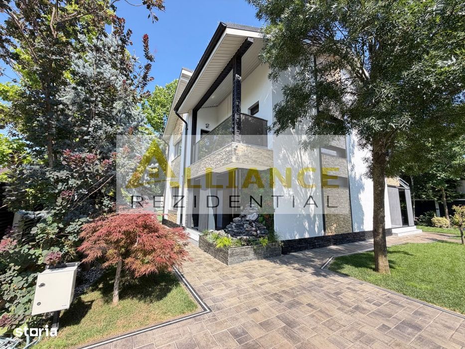 Casa P+1+M cu teren de 650 mp, piscina si curte complet amenajata