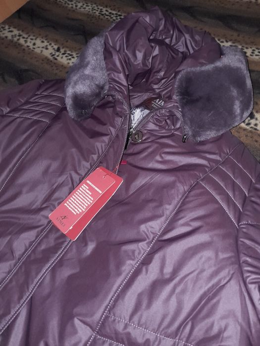 Продам пуховик размер 68-70