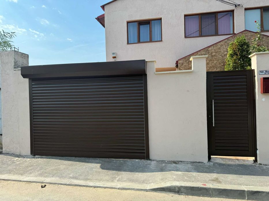 Usi de garaj sectionate rulouri exterioare, automatizari, bariere