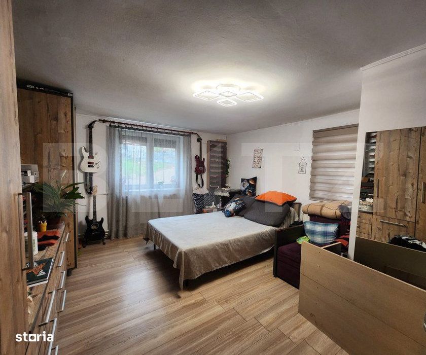 Casa cu 3 camere, 2 bucatarii, Teren de 1000 mp, zona Unirii