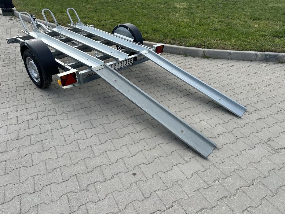 Ремаркета / платформи / колесари за превоз на мотори и АТВ под наем