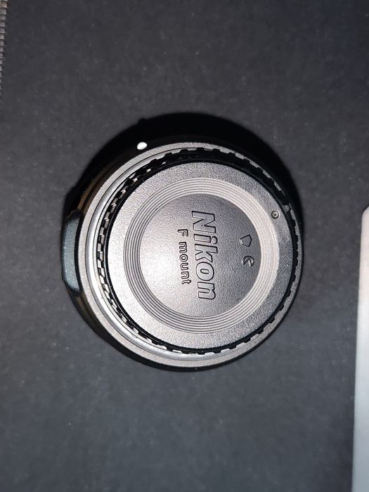 Nikon 50 mm f1.8 Nikkor 50 mm F1.8 като нов