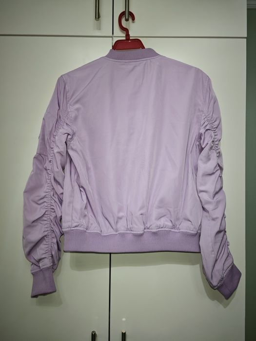 Преходно лилаво яке