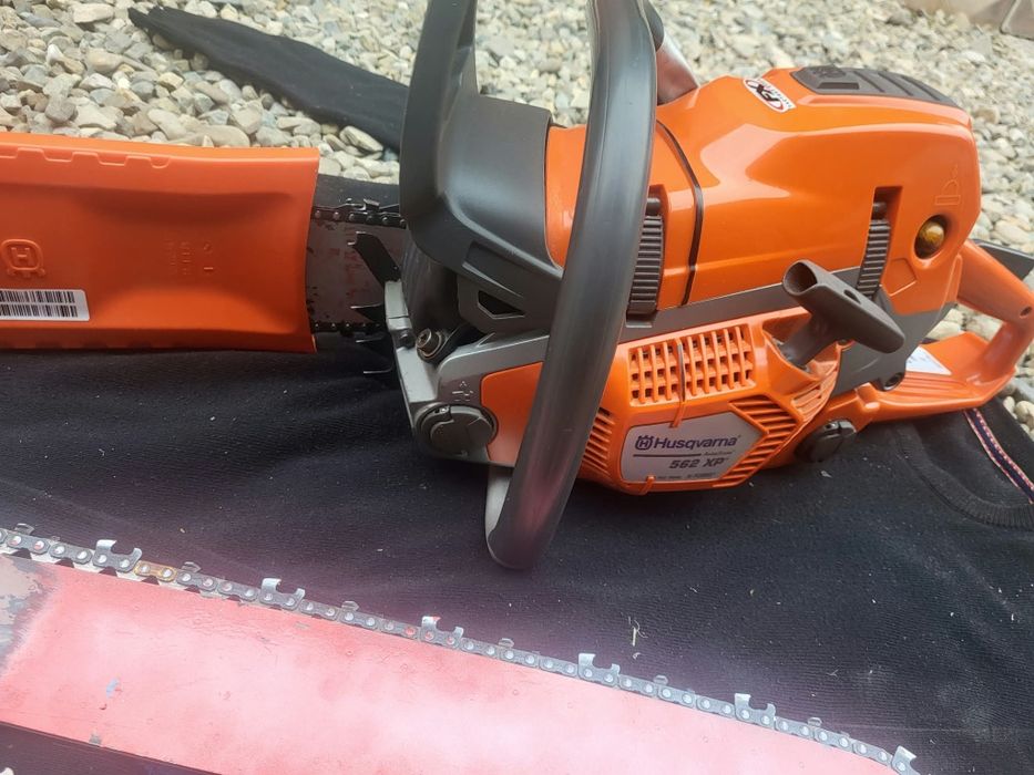 Husqvarna 562 XP cu garanție .Fara urme  sau zgârieturi