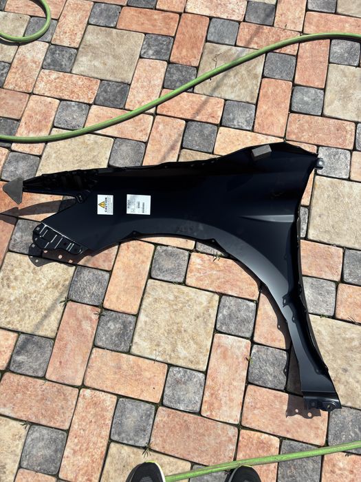 Крыло на камри 75