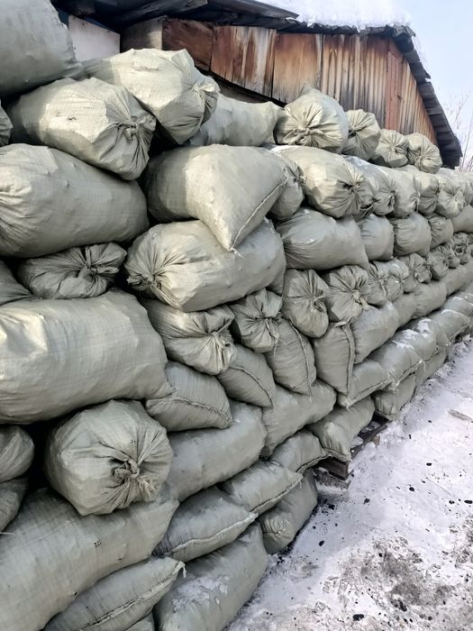 Уголь дрова в мешках 1200