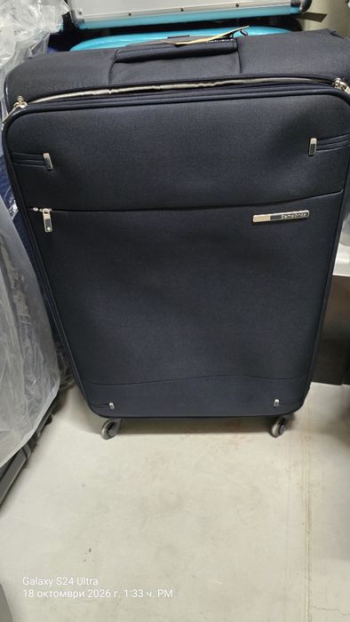 голям текстилен куфар Samsonite Base Boost Spinner
