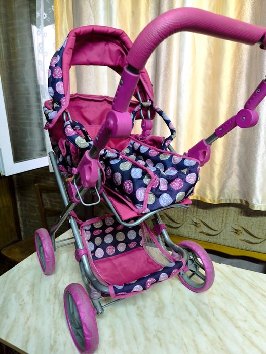 Игрушечная коляска