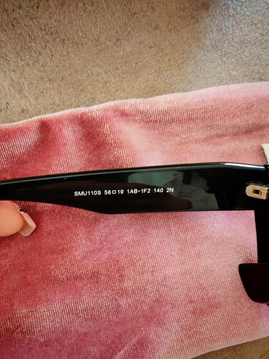 Очила на марката miu miu