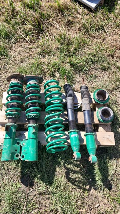 Стойки с амортизатороми